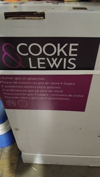 Hornilla de gas butano y ciudad