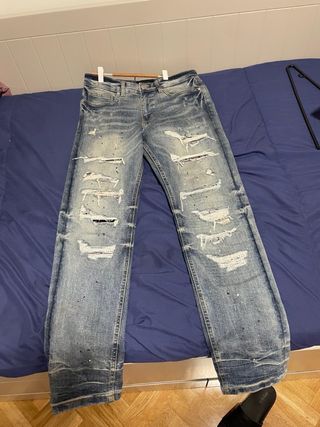 Pantalones vaqueros desgastados