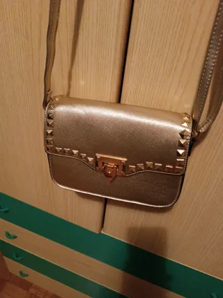 Borsetta donna oro con borchie