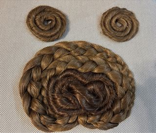 Moño y rodetes fallera castaños