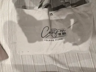 Piano Plegable Carry-on. Como nuevo