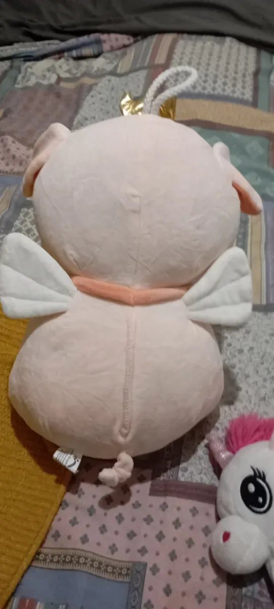 Peluche de cerdito rosa con corona