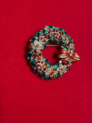 Spilla antica a forma di corona natalizia