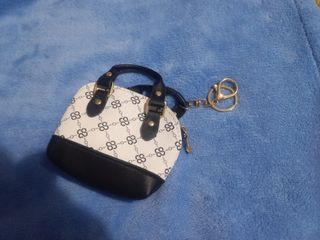 Bolsos monederos para muñecas