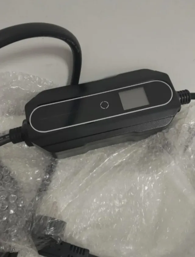 Cargador portátil para coche eléctrico.