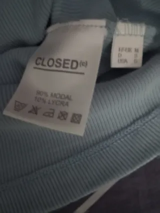 Jersey canutillo celeste cuello pico CLOSED