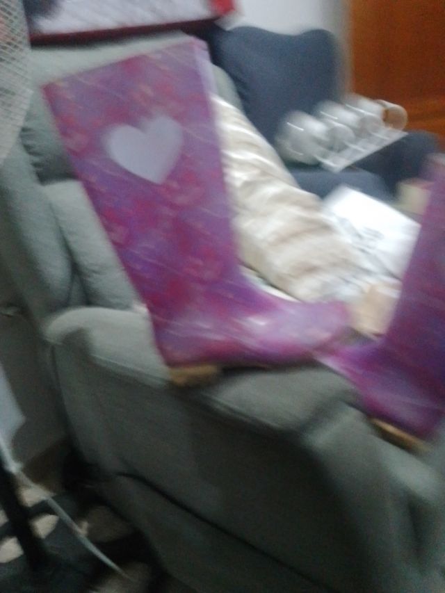 Botas de agua altas moradas con corazones