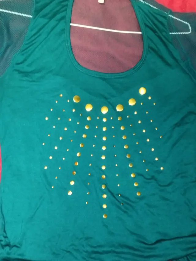 Blusa Larga Atrevida Mangas de Rejilla dorada