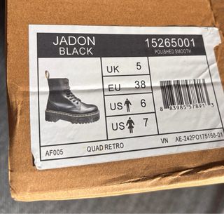 Stivali con plateau neri Dr. Martens