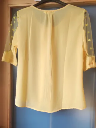 Blusa gialla maniche a pois