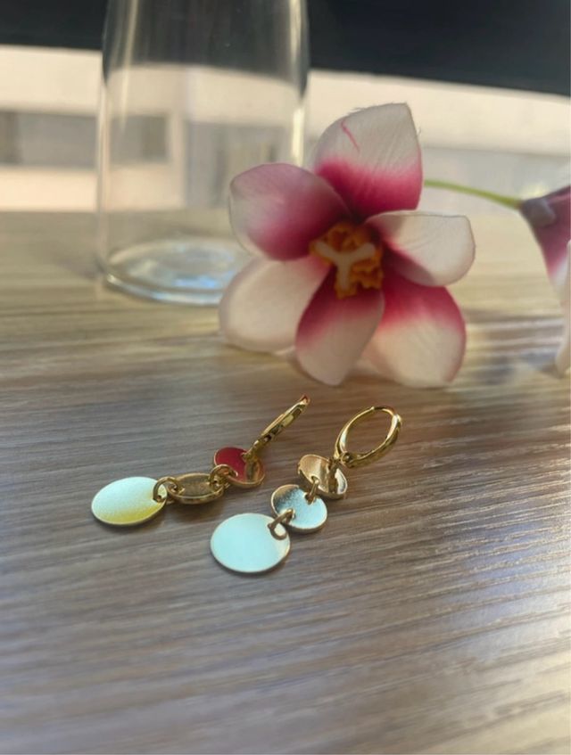 Pendientes Maya dorados.