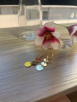 Pendientes Maya dorados.