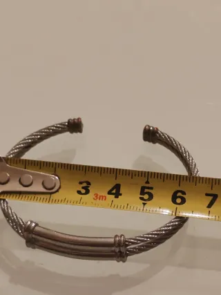 Bracciale rigido a cavo intrecciato