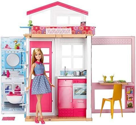 Barbie e la casa delle bambole con accessori di seconda mano per