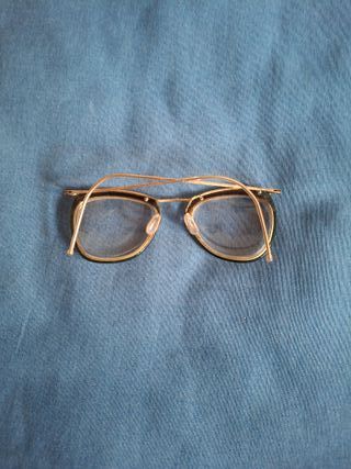 Gafas vintage doradas y negras