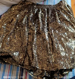 Falda lentejuelas doradas y negras