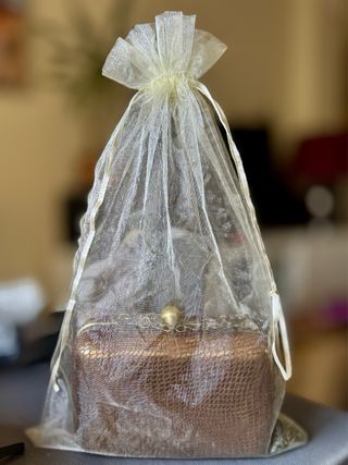 Bolso de fiesta dorado y cobre