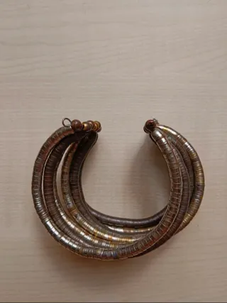 Pulsera rígida tonos dorados 