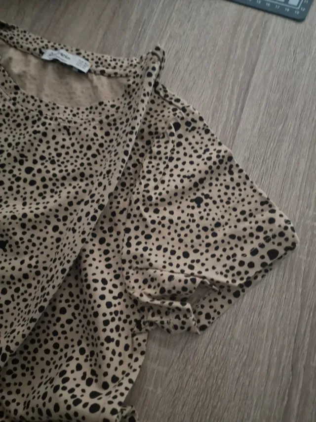 Camiseta animal print beige y negro