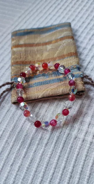 Pulsera elástica de cuentas rosas y transparentes