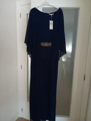 Vestido de fiesta azul con etiqueta