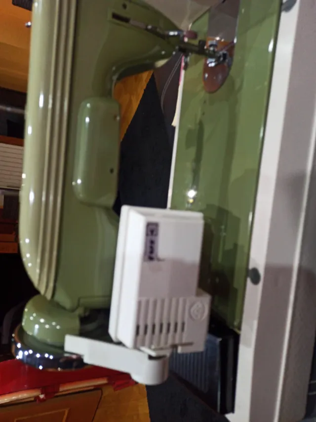 Máquina de coser Sigma verde