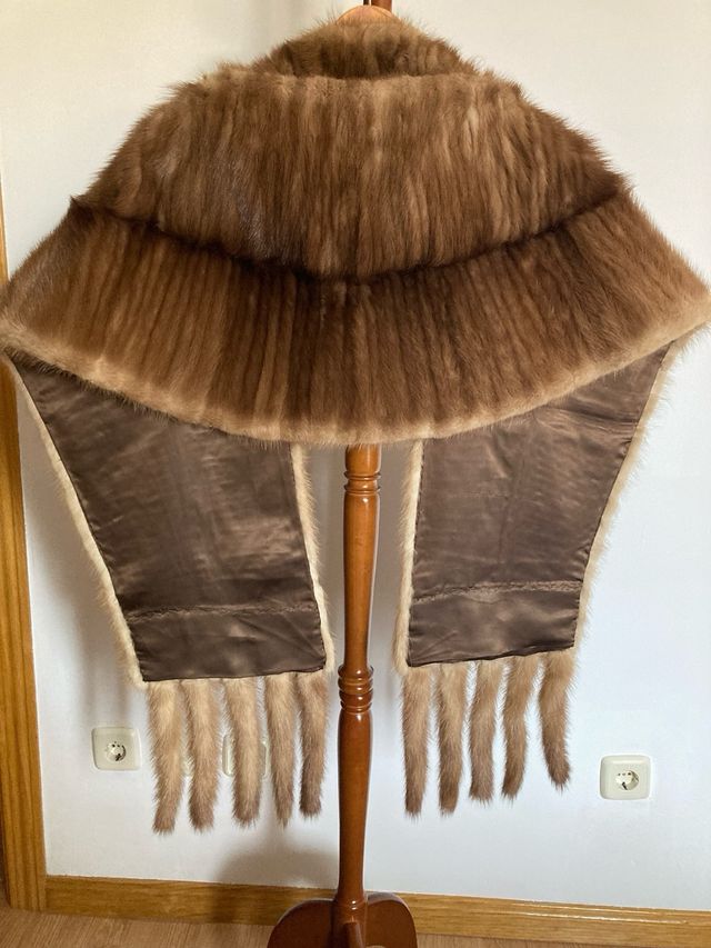 Estola Krikuk colas de bisonte