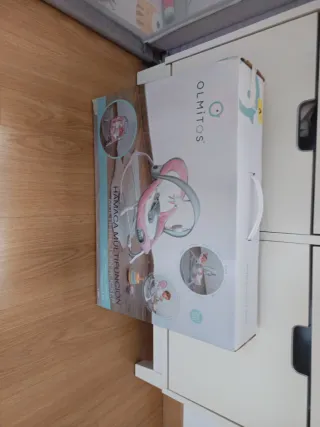 Hamaca bebé con juguetes