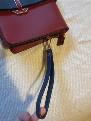 Bolso de mano con banda bicolor