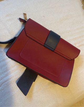 Bolso de mano con banda bicolor