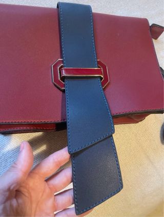 Bolso de mano con banda bicolor