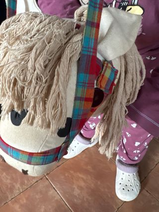 pareja Caballitos de madera con arnés