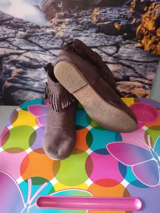Botines marrones con flecos