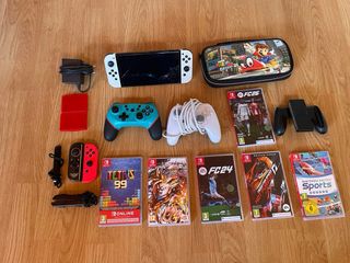 Nintendo Switch OLED con giochi e controller