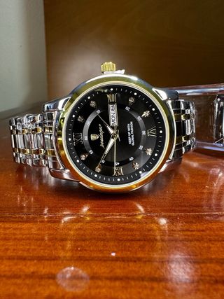 Reloj Poedagar Oro y Plata Nuevo