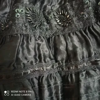 Falda midi Mango negra volantes