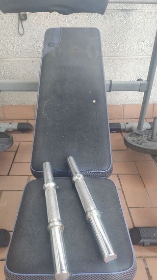 Banco y rack musculación con discos