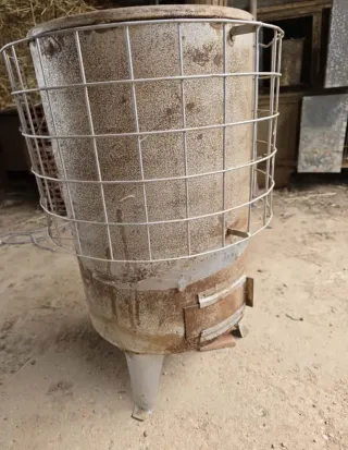 Estufa de leña redonda de metal