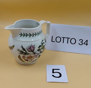 Brocca in ceramica con decorri botanici