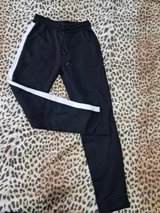 Pantaloni tuta neri con banda bianca