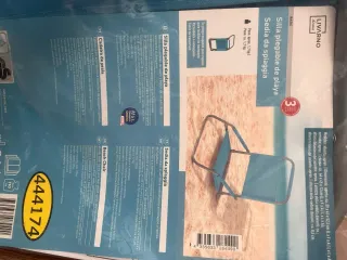 Silla de playa plegable azul y gris