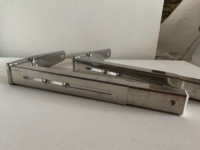 Soportes pared microondas plegables