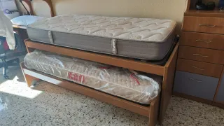 Cama nido con cuatro cajones .