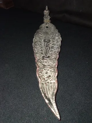 Quemador de incienso plateado .