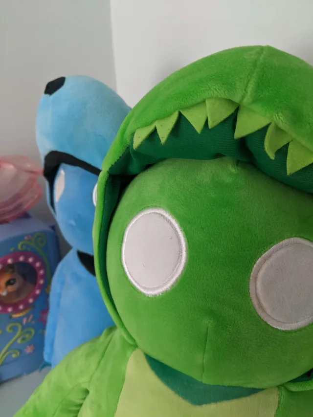 Coppia di animali di peluche (blu e verde)