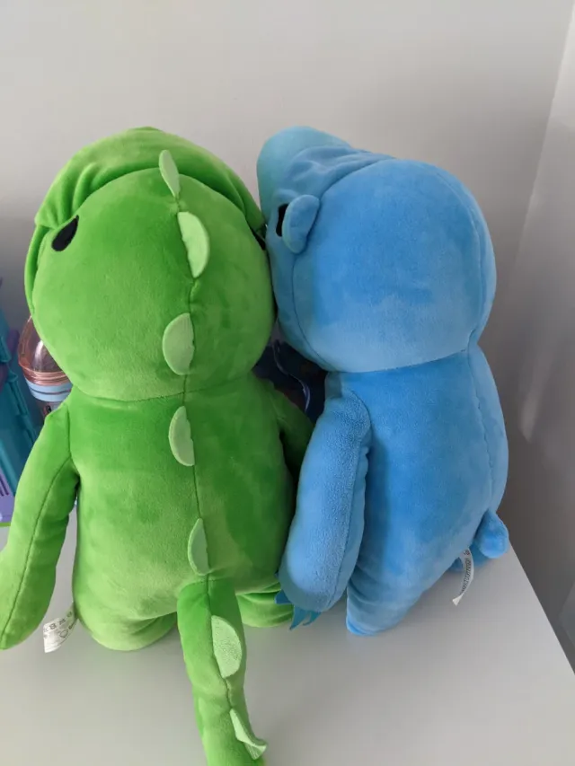 Coppia di animali di peluche (blu e verde)
