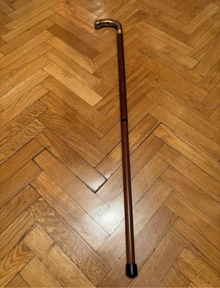 Bastone in legno con impugnatura in bronzo