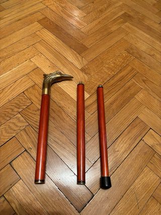 Bastone in legno a testa d'aquila in bronzo