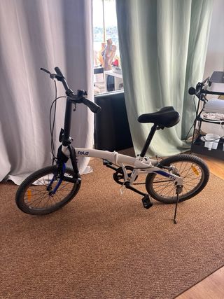 Bicicleta plegable blanca