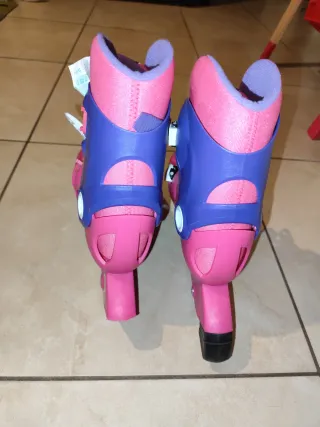 Pattini Oxelo bambina rosa/viola misura 34/36